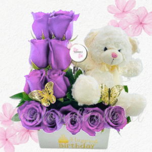 Arreglo peluche en 11 rosas importadas, follaje y 2 maripositas