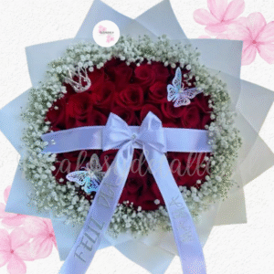 Ramo bouquet buchon en 60 rosas, lazo e ilusión blanca